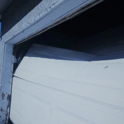 Damage Garage Door