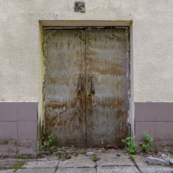 Damaged Garage Door Panels & Weatherstripping