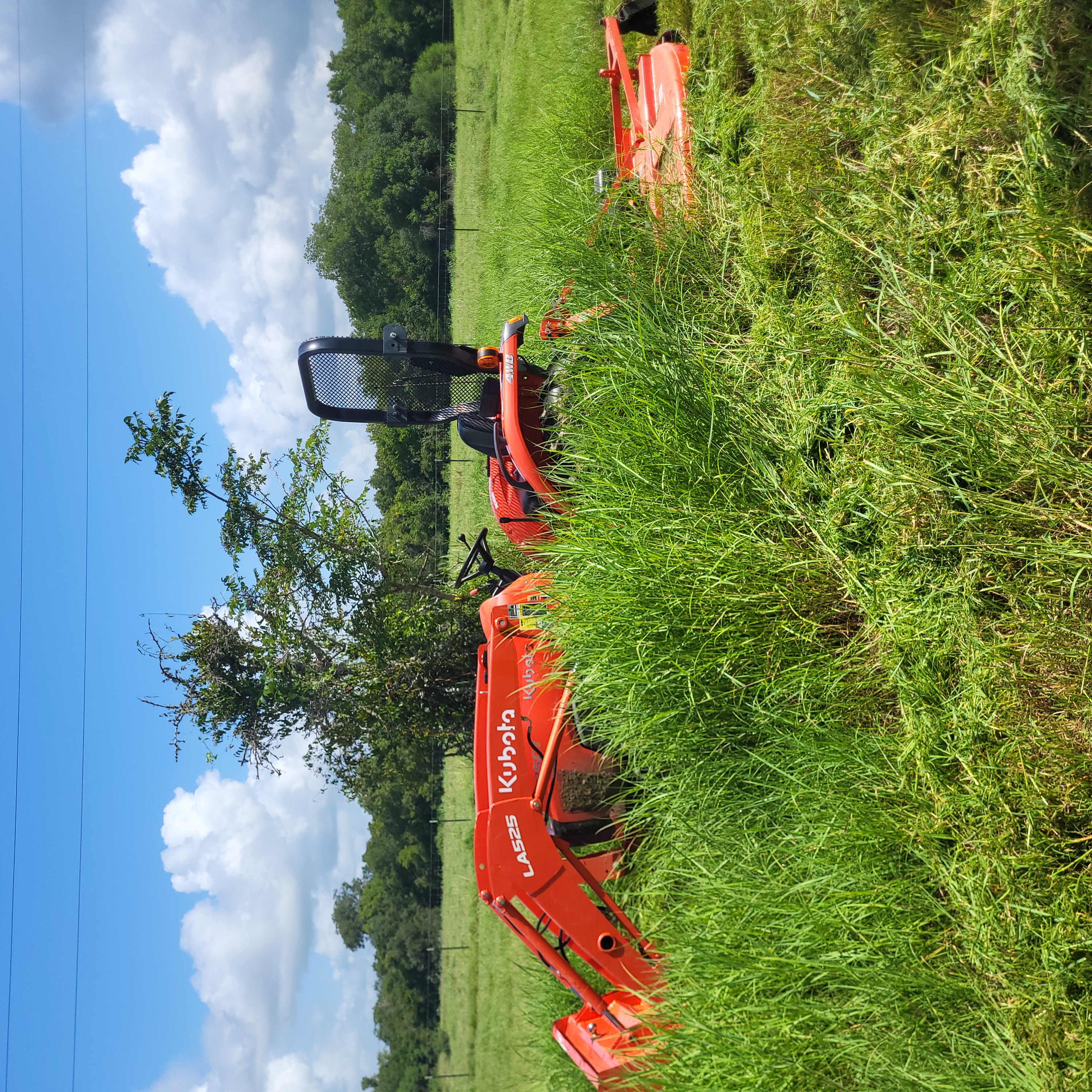 Tractor mowing