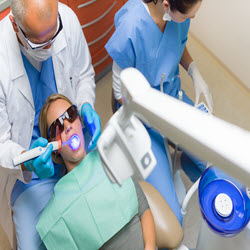 Dentures retained with implants
