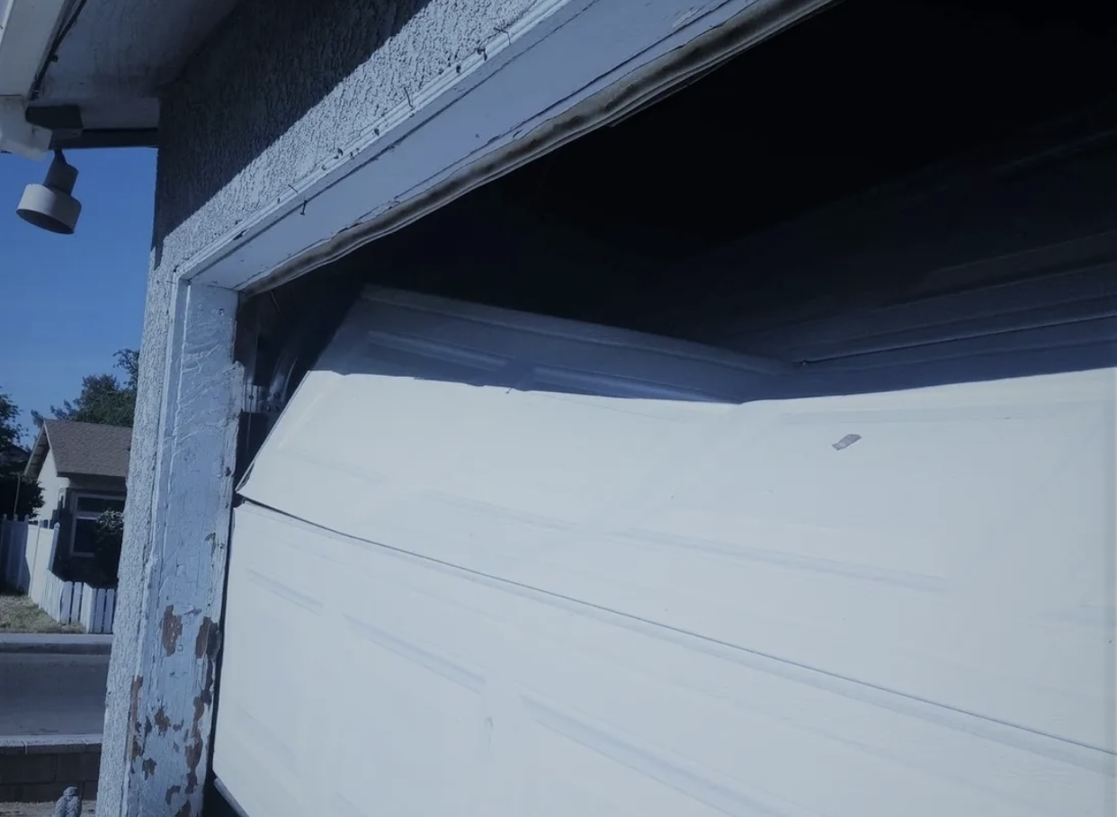 Damage Garage Door